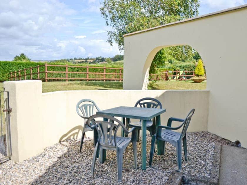 Sitting-out-area | Crossways - Honeysuckle Bungalow, Maidencombe, nr. Torquay