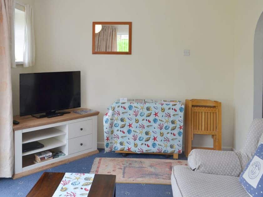 Stylish lounge/diner with patio doors to sitting out area | Apple Tree Apartment - Devon Palms, Maidencombe, near Torquay