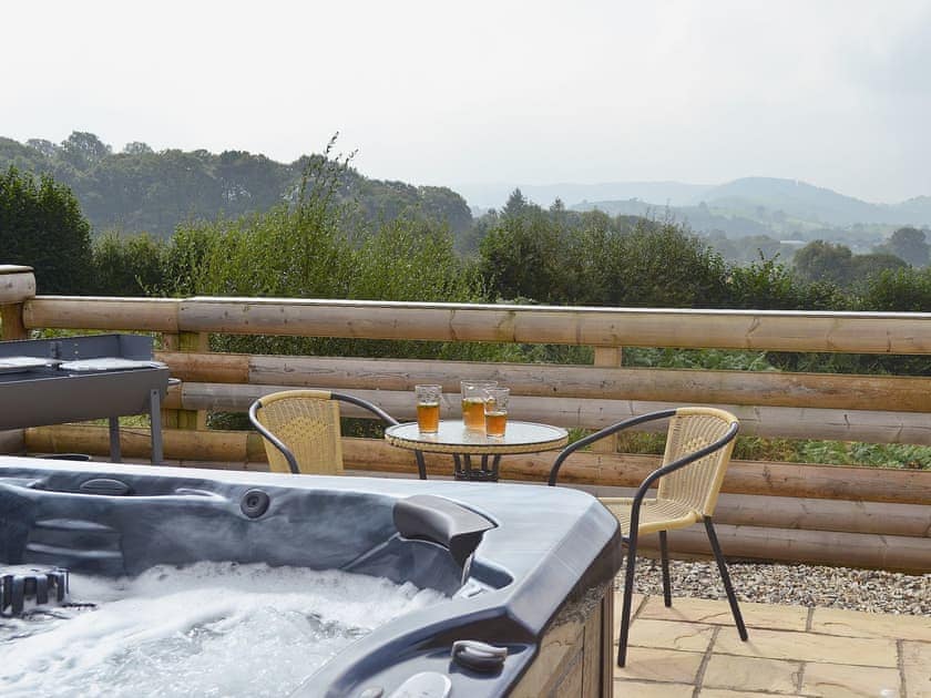 Terrace with hot tub | Cwm Yr Hendy Lodges - Oak View, Crossgates, nr. Llandrindod Wells