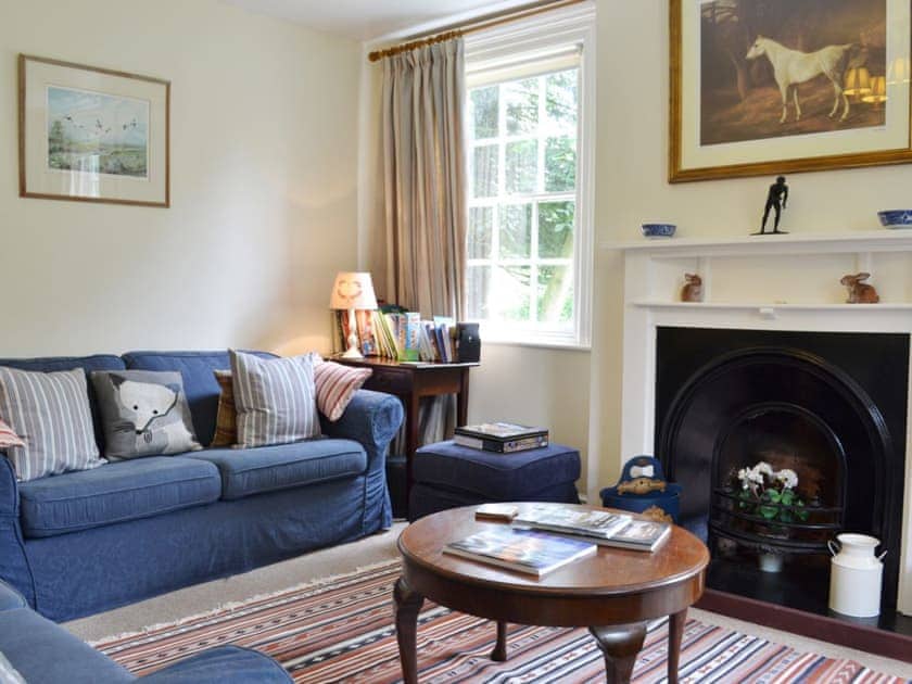 Lovely living room with open fireplace | Laundry Cottage - Thorpe Hall Cottages, Rudston, near Bridlington