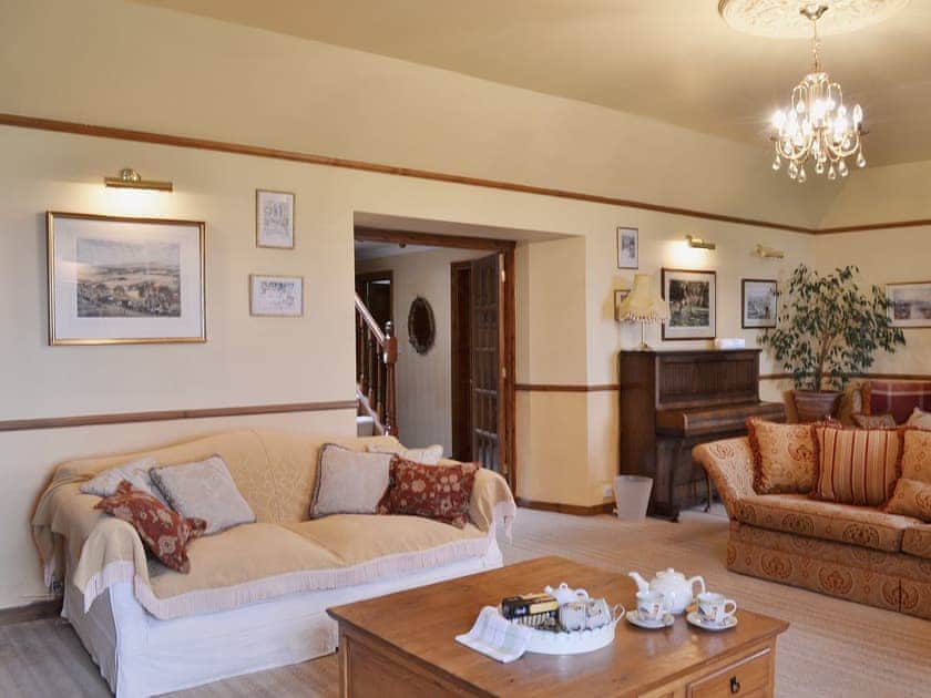 Large living room with its own piano! | Gordons Hall Cottage, Carnbee, near Anstruther
