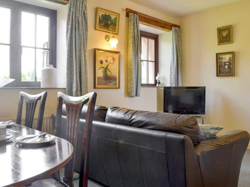 Welcoming living and dining areas of open-plan room | Stables - Periton Park Court, Minehead