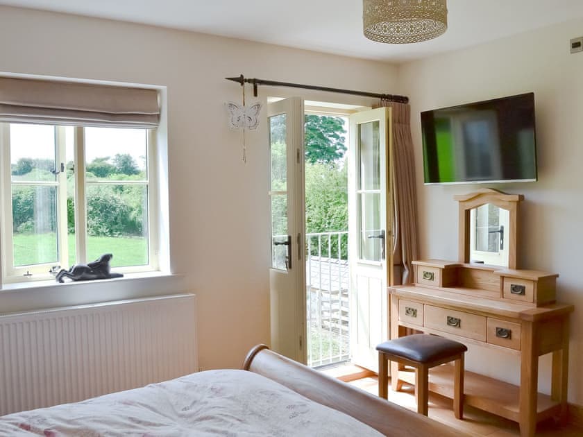Double bedroom with juliet balcony  | Pheasant Fields - Holly and Pines Holidays, Holywell