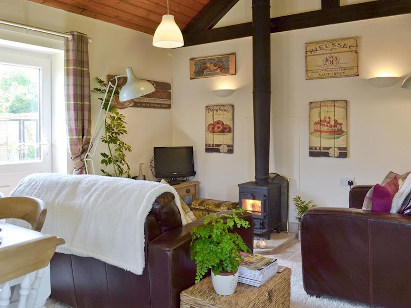 Charming living and dining room with wood burning stove  | Mill Cottage, Stillington, near York