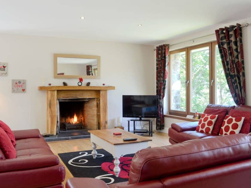 Spacious living area with open fire | The Dutchmans, Colintraive, near Dunoon