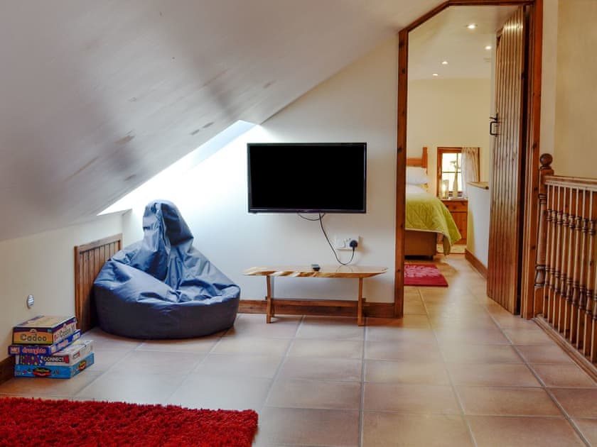 Landing with sitting/reading area | Ty Hir - Bwlchgwyn Equestrian Holidays, Arthog, near Fairbourne