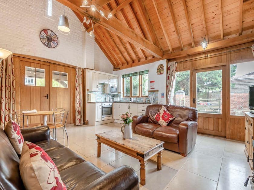 Open plan living space | The Waggon House - Milton End Farm Barns, Arlingham, near Frampton-on-Severn