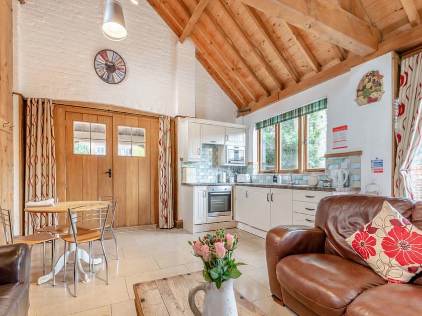 Open plan living space | The Waggon House - Milton End Farm Barns, Arlingham, near Frampton-on-Severn