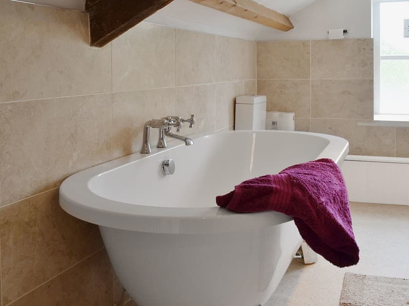 Freestanding bath | The Mill Farmhouse (Ty Fferm Y Felin), Llandybie, near Llandeilo