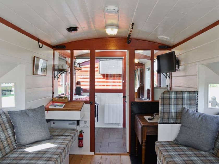 Living room | Brockford Railway Sidings - The Guards Van, Brockford, nr. Stowmarket