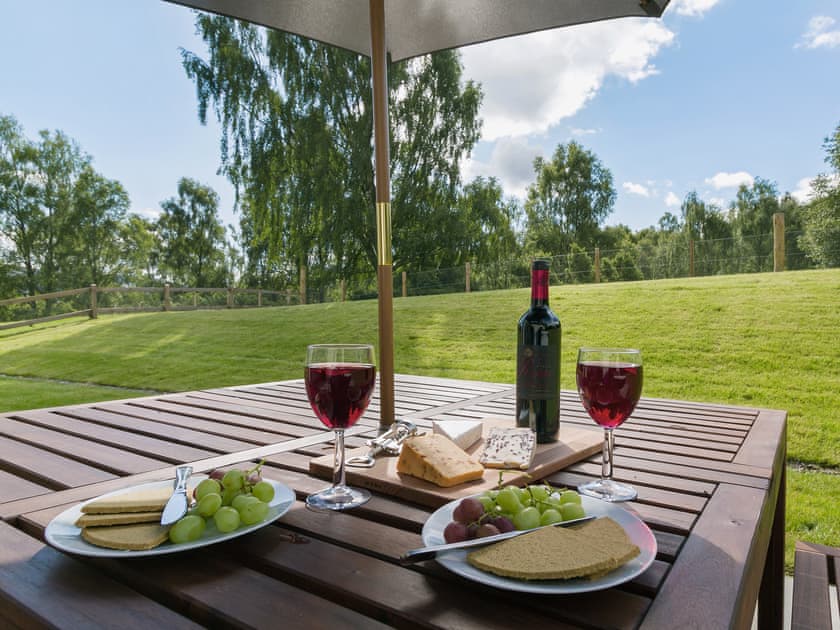 The large enclosed garden is perfect for relaxing | Birch Corner, Aviemore