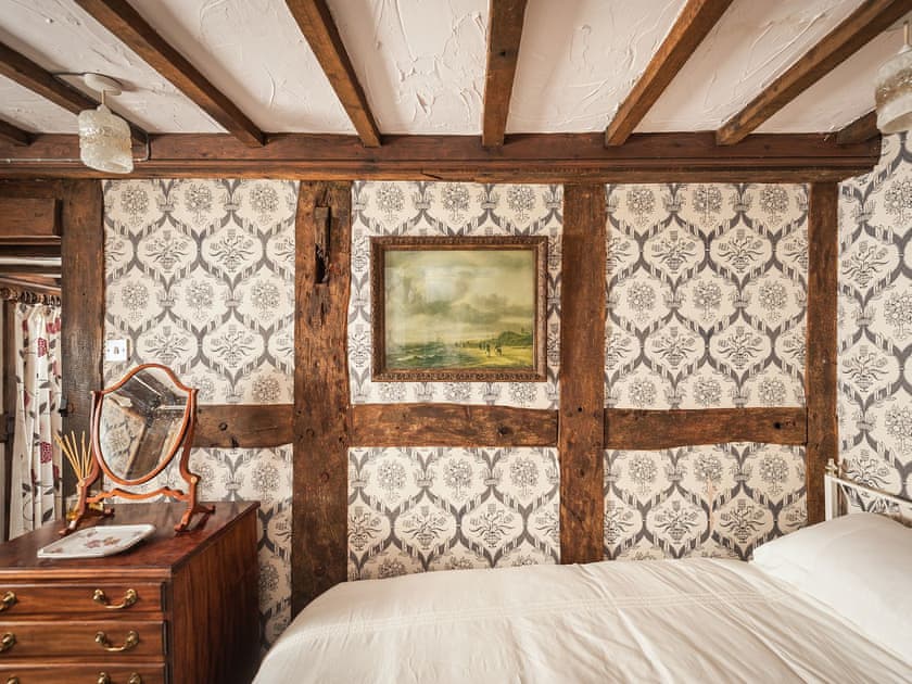 Twin bedroom with traditional features including beamed ceiling | Pen Copi, Trefeglwys, near Caersws