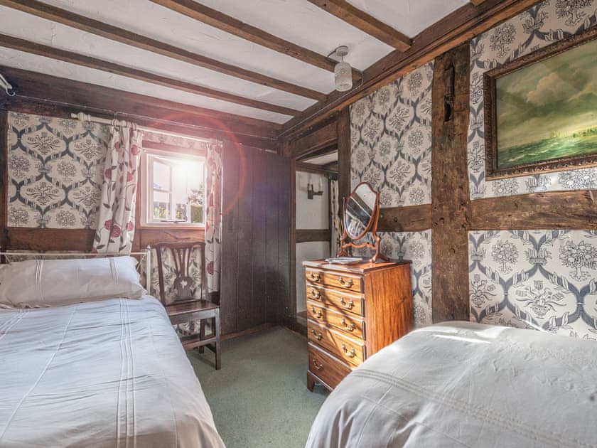 Twin bedroom with traditional features including beamed ceiling | Pen Copi, Trefeglwys, near Caersws