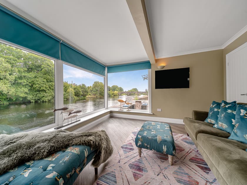 There are views both up and down the river from the living room | Creebank, Newton Stewart
