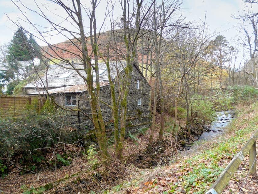 The Mill showing River Glenderamackin and Souther Fell