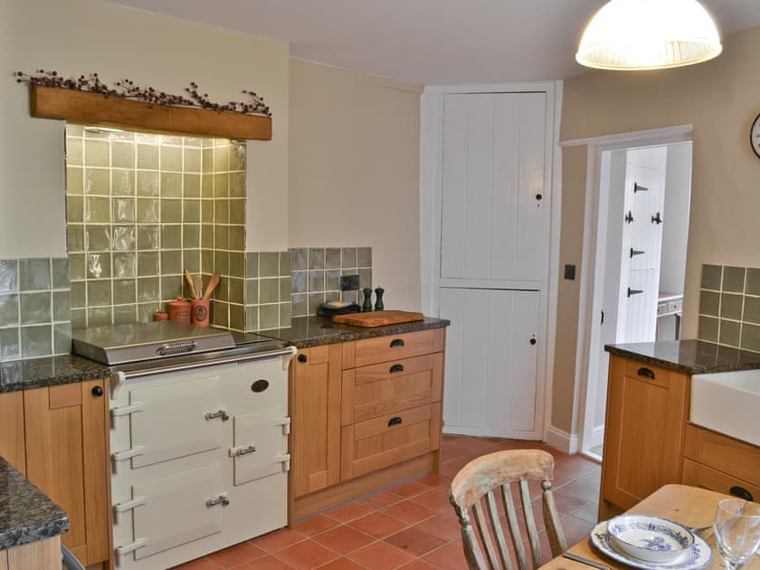 Kitchen diner with range cooker and belfast sink | Pippin Cottage, Holt