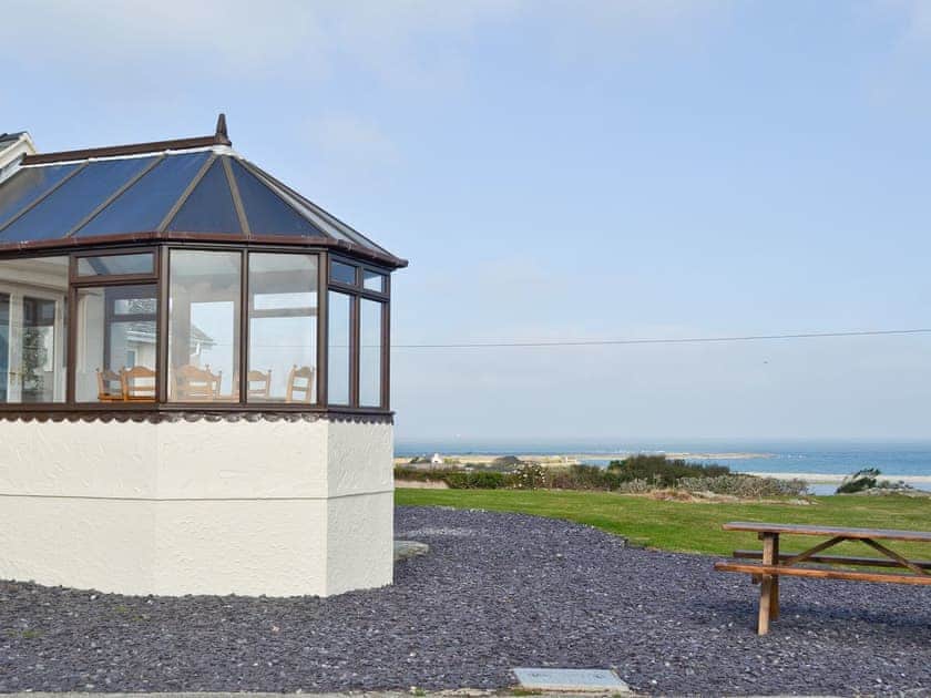 Conservatory with amazing coastal views | Bwthyn Pereos, Cemlyn near Amlwch