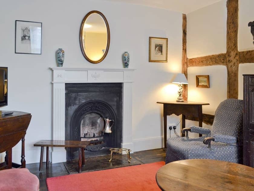Oak beamed walls in sitting room | Friary Cottage, Ludlow