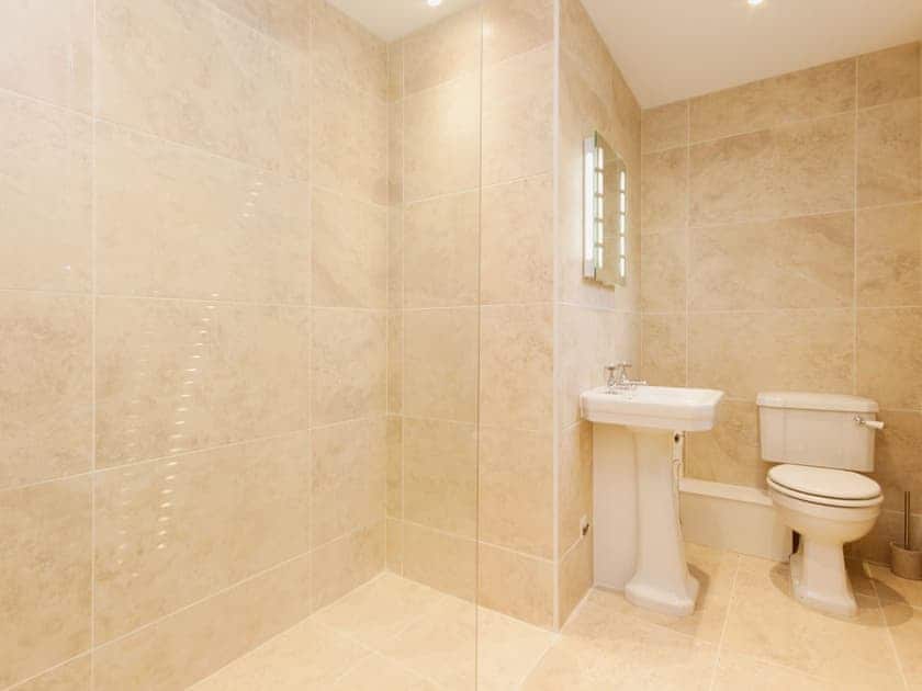 An en suite shower room, full tiled, is a great addition to the master bedroom | Elm Grove, Dartmouth