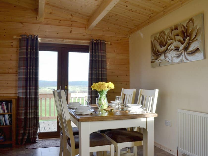 Lovely dining area with views to the surrounding countryside | Callow Lodge, Bromlow, near Minsterley