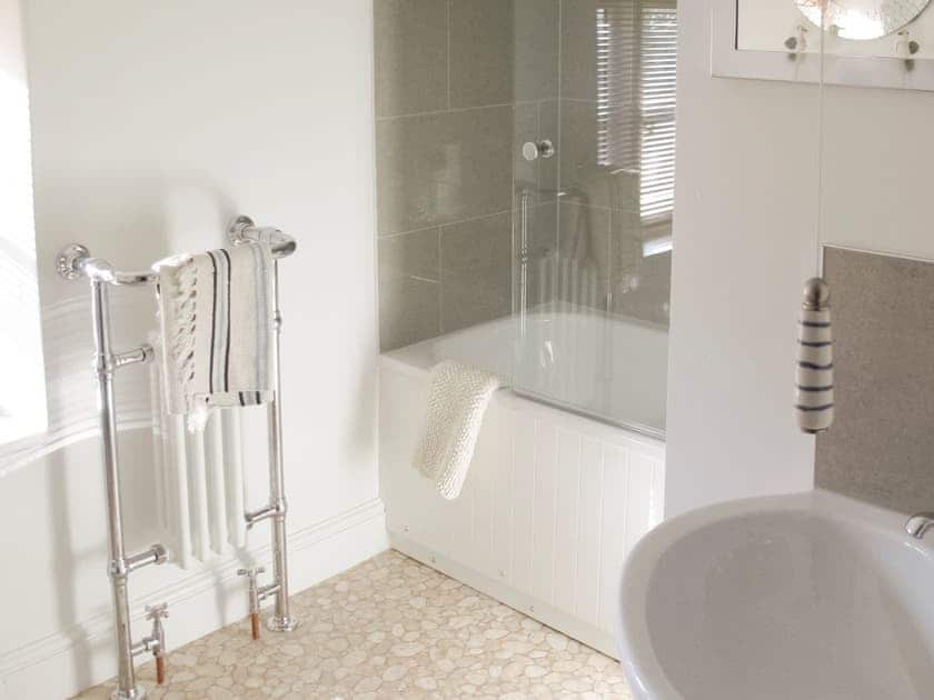 Family bathroom with shower over bath | Sea Breeze, Blakeney