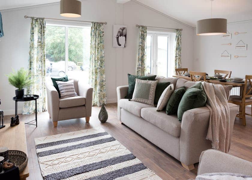 All imagery shown is a representation only. Style, decor and exact views vary by lodge. | Orchard Deluxe 3 Hot Tub Pet - Clawford Lakes Resort and Spa, Clawton, Nr Holsworthy