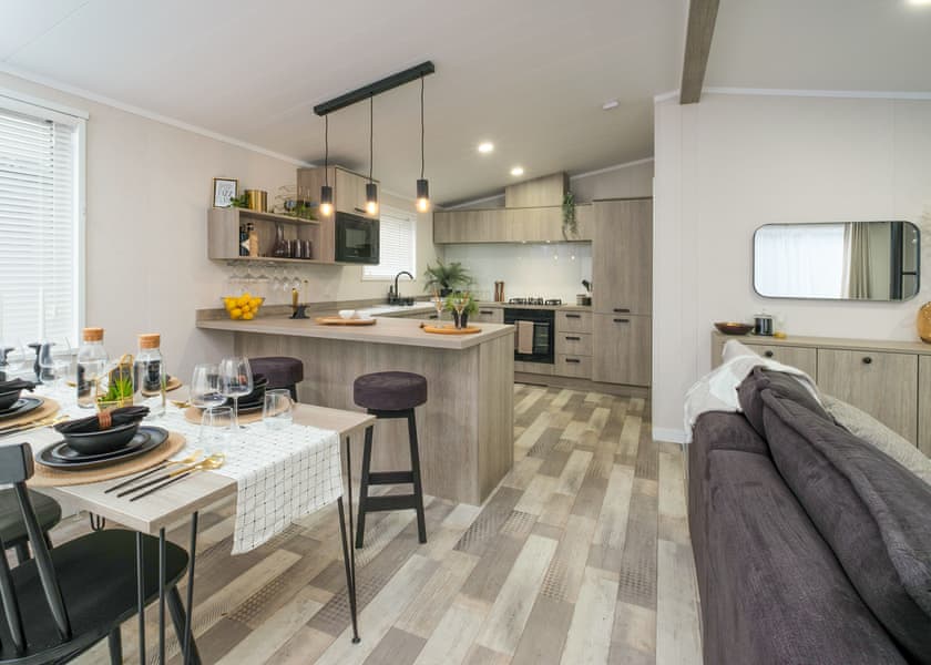 All imagery shown is a representation only. Style, decor and exact views vary by lodge | Orchard Deluxe Double Lakes 3 Hot Tub Pet - Clawford Lakes Resort and Spa, Clawton, Nr Holsworthy