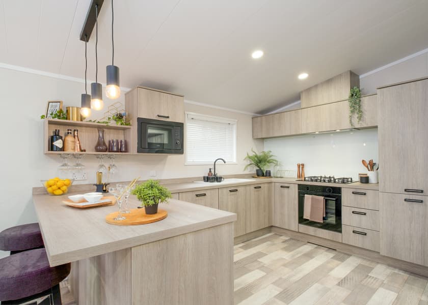 All imagery shown is a representation only. Style, decor and exact views vary by lodge | Orchard Deluxe Double Lakes 3 Hot Tub Pet - Clawford Lakes Resort and Spa, Clawton, Nr Holsworthy