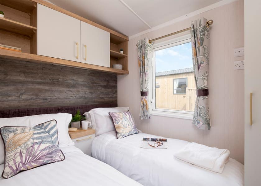 Please note: All imagery shown is a representation only. Style, decor and exact views vary by lodge | Willows Lake View 2 Bed Holiday Home - Clawford Lakes Resort and Spa, Clawton, Nr Holsworthy