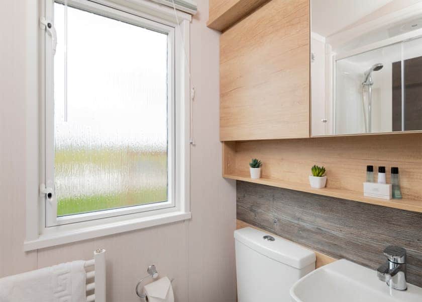 Please note: All imagery shown is a representation only. Style, decor and exact views vary by lodge | Willows Lake View 2 Bed Holiday Home - Clawford Lakes Resort and Spa, Clawton, Nr Holsworthy