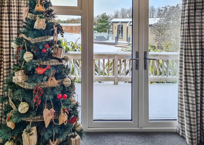Oak Christmas tree to snowy external | Croft Park Lodges, Little Weighton, Nr Beverley