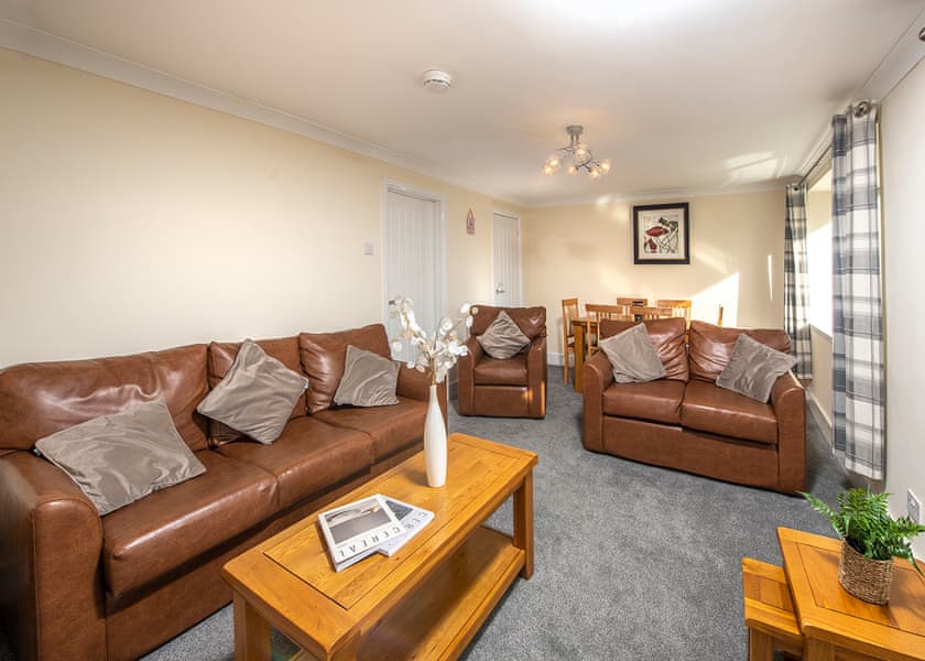 Living room/dining room | Killigarth Cottage (Sat) - Killigarth Manor, Polperro, Looe