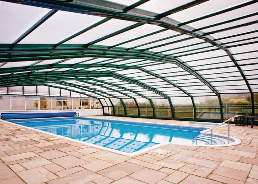 Covered heated pool at Andrewhayes Holiday Park | Larkshayes Cottages, Dalwood, Axminster