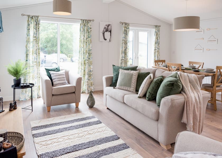 All imagery shown is a representation only. Style, decor and exact views vary by lodge | Valley Park View 2 bed Hot Tub Pet (sleeps 4) - Lakeview Manor Lodges, Dunkeswell, Honiton