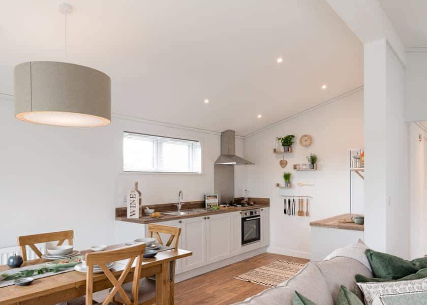 All imagery shown is a representation only. Style, decor and exact views vary by lodge | Valley Park View 2 bed Hot Tub Pet (sleeps 4) - Lakeview Manor Lodges, Dunkeswell, Honiton