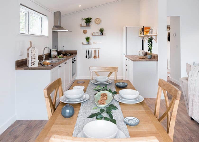 All imagery shown is a representation only. Style, decor and exact views vary by lodge | Valley Park View 2 bed Hot Tub Pet (sleeps 4) - Lakeview Manor Lodges, Dunkeswell, Honiton