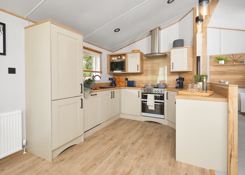 All imagery shown is a representation only. Style, decor and exact views vary by lodge | Valley Park View 3 bed Hot Tub Pet (sleeps 6) - Lakeview Manor Lodges, Dunkeswell, Honiton