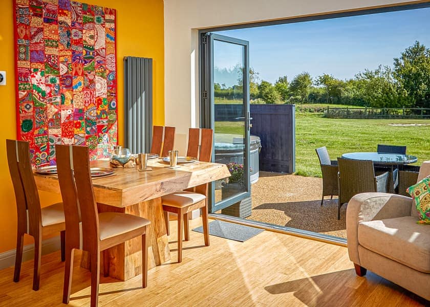 Stylish open-plan living space with bi-fold door to patio | The Raj - North Star Sanctum, Fitling, near Hornsea