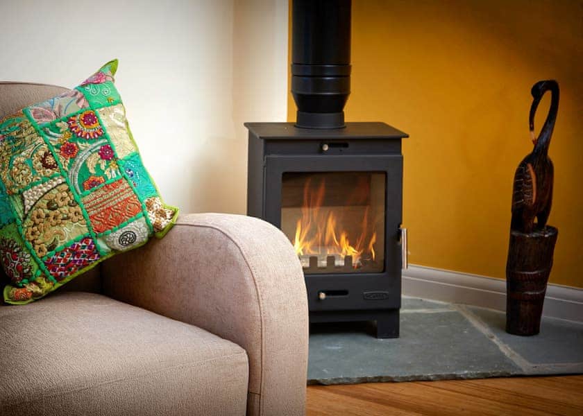 Warming wood burner | The Raj - North Star Sanctum, Fitling, near Hornsea