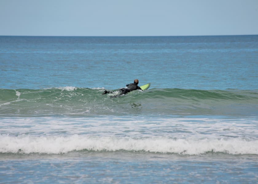 Surfing at Pease Bay