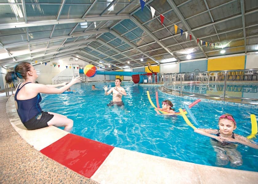 Indoor heated swimming pool with waterslide