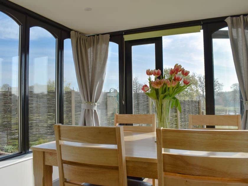 Conservatory with dining area | Woodpeckers, Cowbeech, near Hailsham