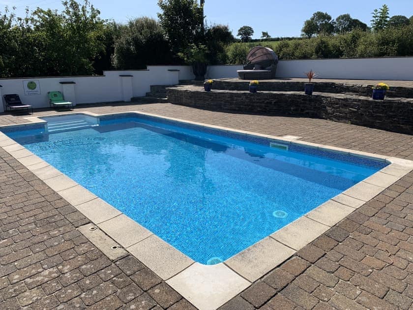 Swimming pool | Canllefaes Cottages, Penparc
