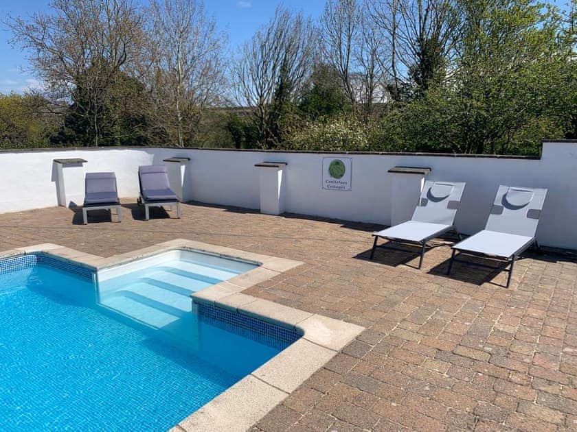 Swimming pool | Canllefaes Cottages, Penparc