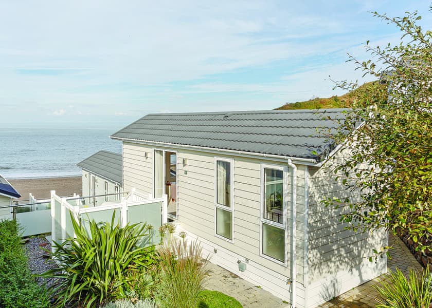 Beach Cove Coastal Retreat in Hele Bay, Lodges Book