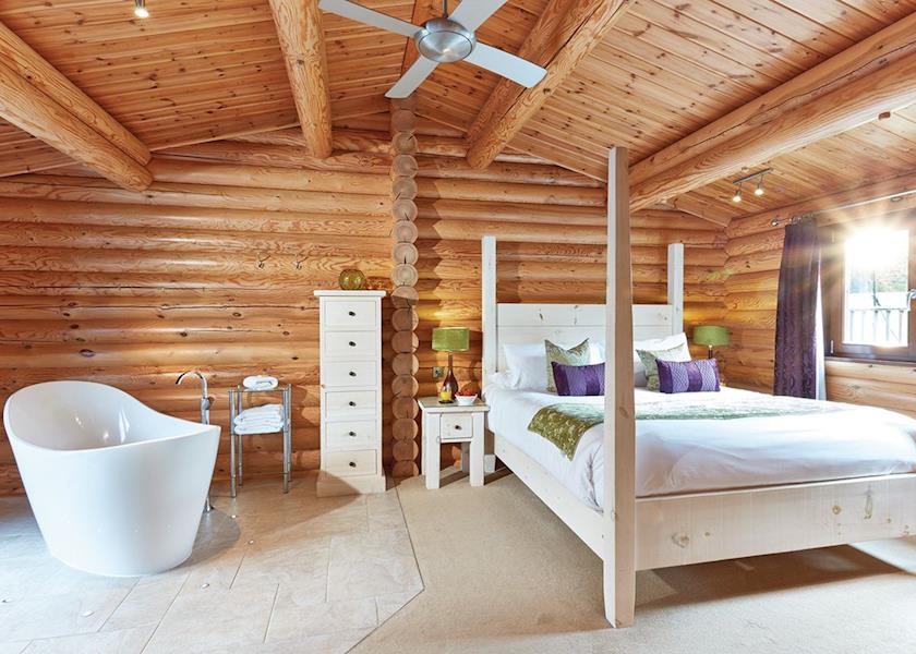 Cosy, romantic bedroom at a luxury Autograph Lodge